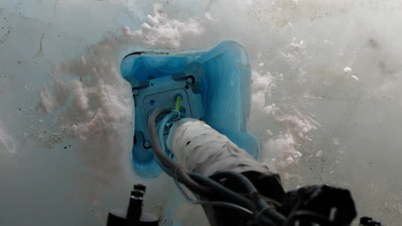 The IceMole drill prototype melts into the Blood Falls glacier in Anarctica during a test of technology for a mission to explore Saturn's icy moon Enceladus. The drill collected an uncontaminated water sample from inside the glacier.