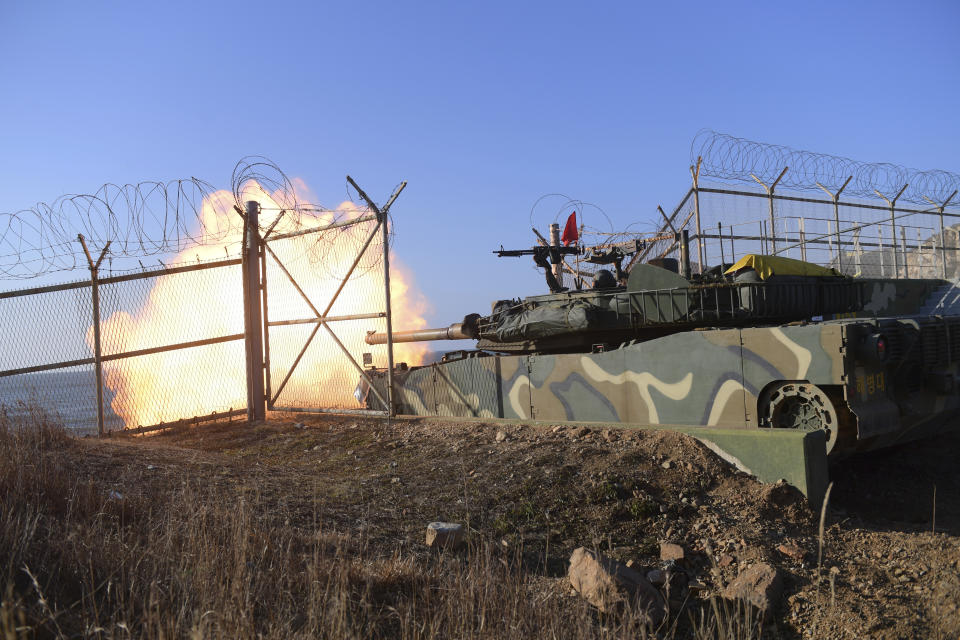 In this photo provided by South Korea Defense Ministry, South Korea's tank fires during a fire exercises at the Northwest Islands area in South Korea, Friday, Jan. 5, 2024. (South Korea Defense Ministry via AP)