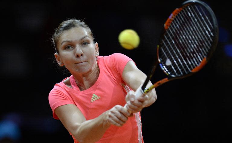 World number two Simona Halep has slumped to a shock 7-6 (8/6), 6-3 defeat to France's Alize Cornet in the first round of the Madrid Open