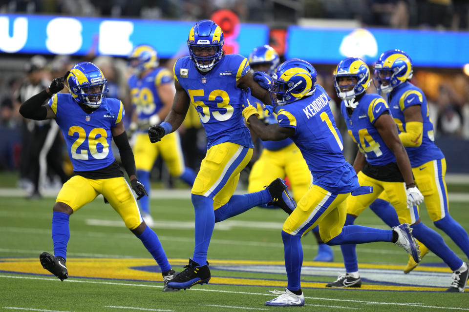 Los Angeles Rams celebrate after cornerback Derion Kendrick intercepts a pass during the second half of an NFL football game against the Seattle Seahawks Sunday, Nov. 19, 2023, in Inglewood, Calif. (AP Photo/Ashley Landis)