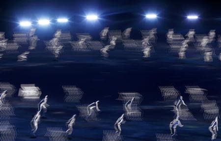 Performers take part in the opening ceremony of the 2014 Sochi Winter Olympics, February 7, 2014. REUTERS/Mark Blinch