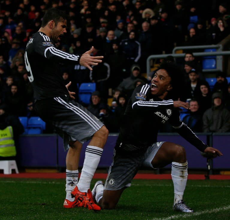 Chelsea's Willian (R) and Diego Costa celebrate their team's second goal against Crystal Palace on January 3, 2016