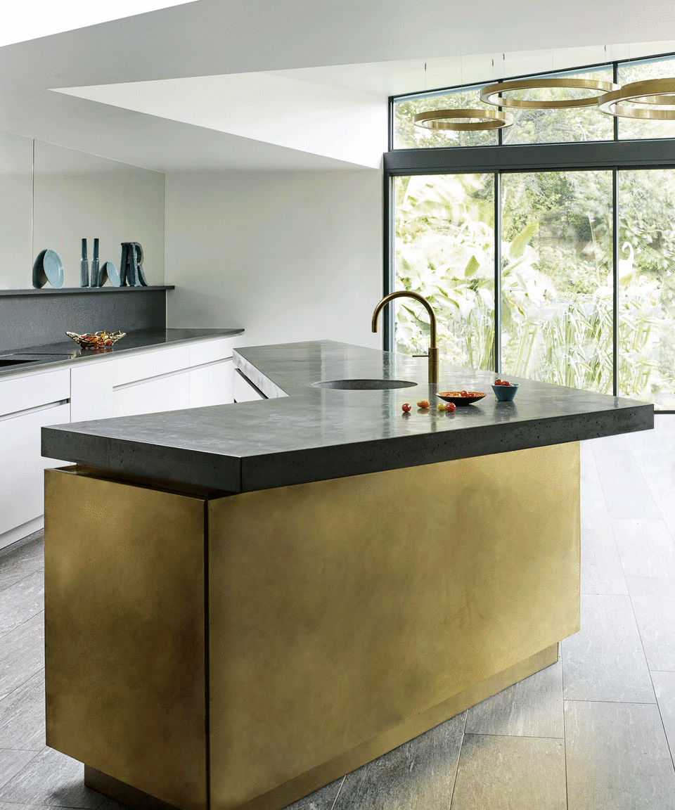 metallic kitchen island in an unusual shape