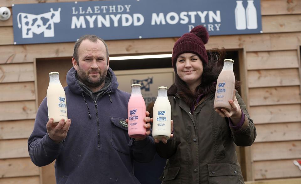 Einion and Elliw Jones of Mynydd Mostyn Dairy near Mostyn have set up a drive thru for milk produced on their farm along with milkshakes and coffee. Photo by Ian Cooper