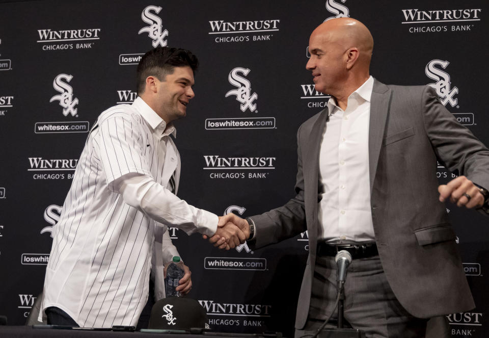 New White Sox outfielder Andrew Benintendi shakes hands with manager Pedro Grifol after being introduced Wednesday, Jan. 4, 2023 at Guaranteed Rate Field in Chicago. (Brian Cassella/Chicago Tribune via AP)