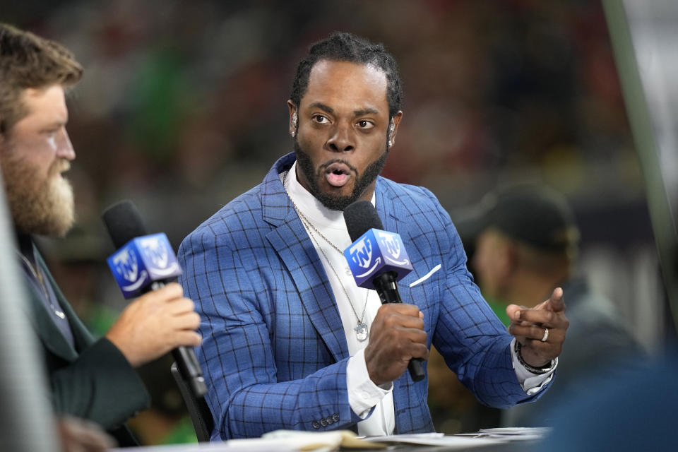 TNF's Richard Sherman on set before an NFL football game between the Houston Texans and the San Francisco 49ers Thursday, Aug. 25, 2022, in Houston. (AP Photo/David J. Phillip)