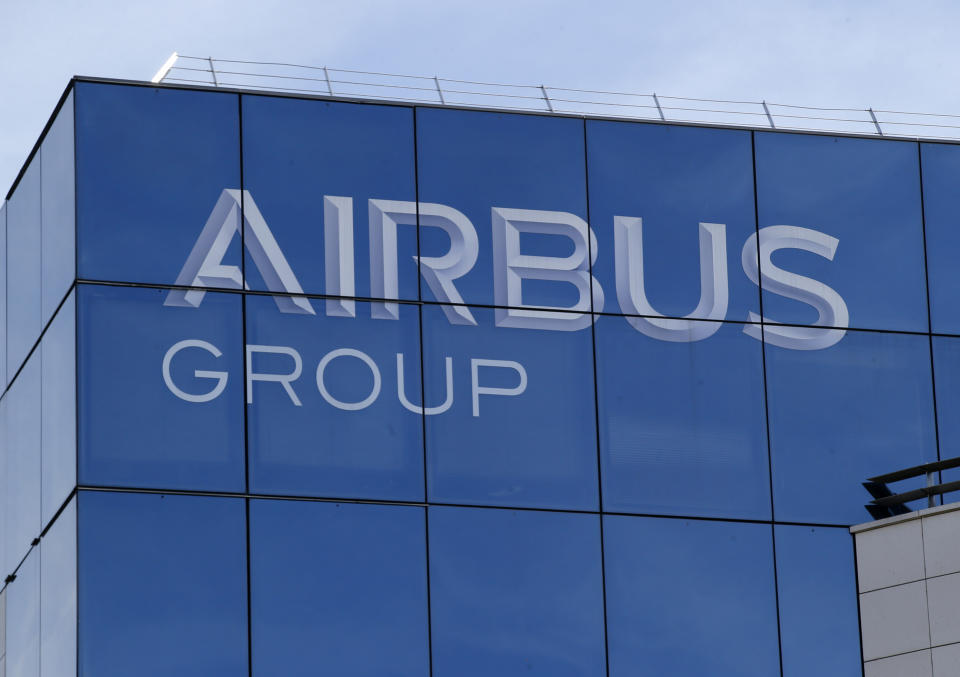 FILE - In this May 6, 2016 file photo, the logo of the Airbus Group is pictured in Suresnes, outside Paris, France. European plane maker Airbus lost 1.1 billion euros ($1.3 billion) amid an unprecedented global slump in air travel because of the pandemic, but expects to deliver hundreds of planes and make a profit this year. (AP Photo/Michel Euler, File)