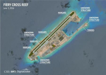 Construction are seen on Fiery Cross Reef in the Spratly islands, in the disputed South China Sea in this June 3, 2016 satellite image released by the Asian Maritime Transparency Initiative at the Center for Strategic and International Studies (CSIS) to Reuters on August 9, 2016. CSIS Asia Maritime Transparency Initiative/DigitalGlobe/Handout via REUTERS