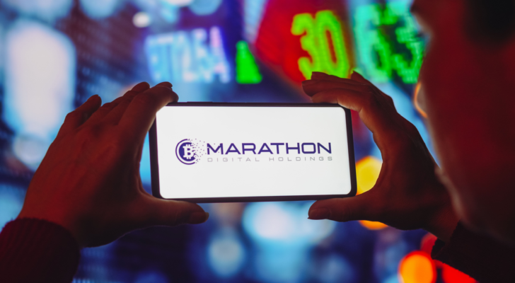 In this photo illustration the Marathon Digital Holdings (MARA) logo seen displayed on a smartphone screen