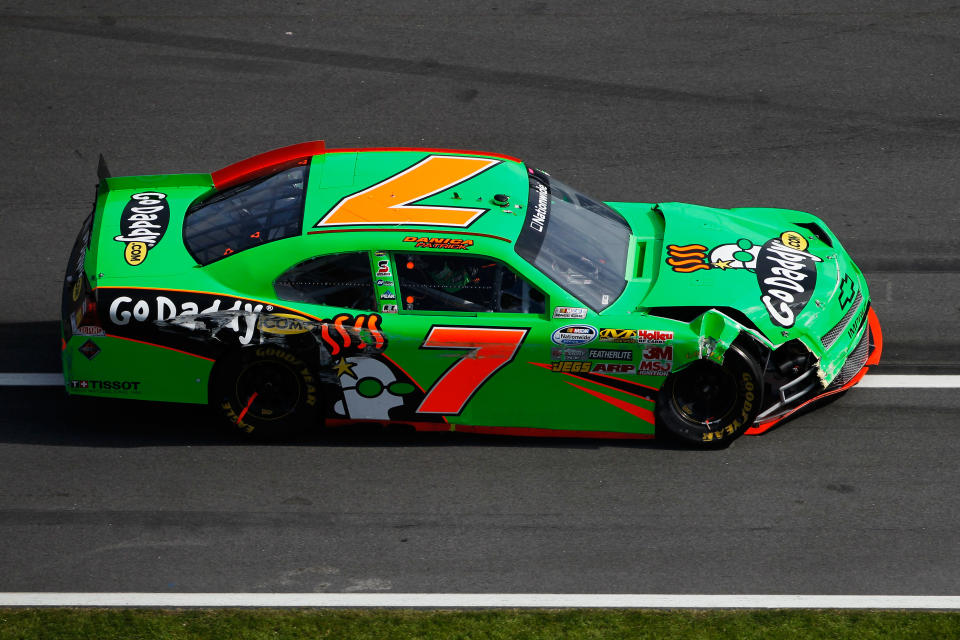 DAYTONA BEACH, FL - FEBRUARY 25: Danica Patrick drives the wrecked #7 GoDaddy.com Chevrolet down pit lane after being involved in an on track incident during the NASCAR Nationwide Series DRIVE4COPD 300 at Daytona International Speedway on February 25, 2012 in Daytona Beach, Florida. (Photo by Tom Pennington/Getty Images for NASCAR)