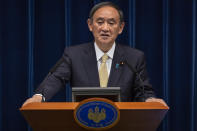 Japanese Prime Minister Yoshihide Suga speaks during a press conference on Friday, April 23, 2021 in Tokyo, Japan. Japan has issued a third state of emergency for Tokyo and three western prefectures to curb a surge in the coronavirus just three months ahead of the Olympics. (Yuichi Yamazaki/Pool Photo via AP)