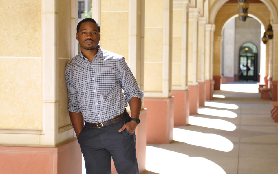 In this Wednesday, June 19, 2013 photo, Ryan Coogler, director of the film, "Fruitvale Station," poses for a portrait at the University of Southern California in Los Angeles. Coogler’s first dramatic feature, “Fruitvale Station," his first project since graduating with his master’s degree in 2011, won both jury and audience awards at the Sundance Film Festival, where the Weinstein Co. outbid a dozen studios to distribute it. It opens Friday, July 12, 2013, in New York and Los Angeles and around the nation later this month, and Oscar buzz has already begun. (Photo by John Shearer/Invision/AP)