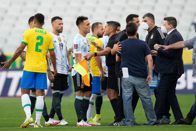 Brazil and Argentina players talk after their World Cup qualifying match in Sao Paulo is suspended due to alleged coronavirus breaches