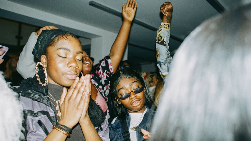 Crowd dancing at party at Keakie Studios, Shoreditch, London, UK, 2019