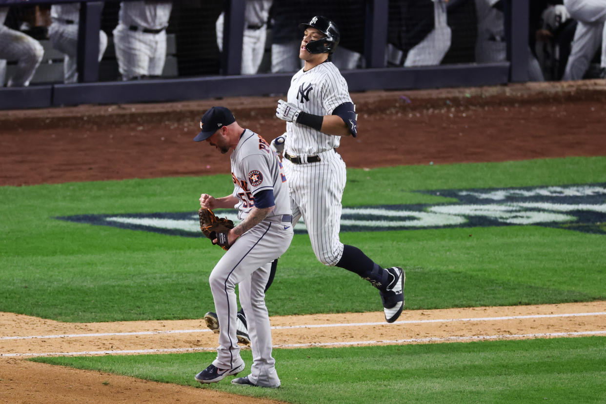 NEW YORK, NEW YORK - OCTOBER 23: Ryan Pressly #55 of the Houston Astros celebrates the final out of Aaron Judge #99 of the New York Yankees to win game four of the American League Championship Series and advance to the World Series at Yankee Stadium on October 23, 2022 in the Bronx borough of New York City. (Photo by Al Bello/Getty Images)