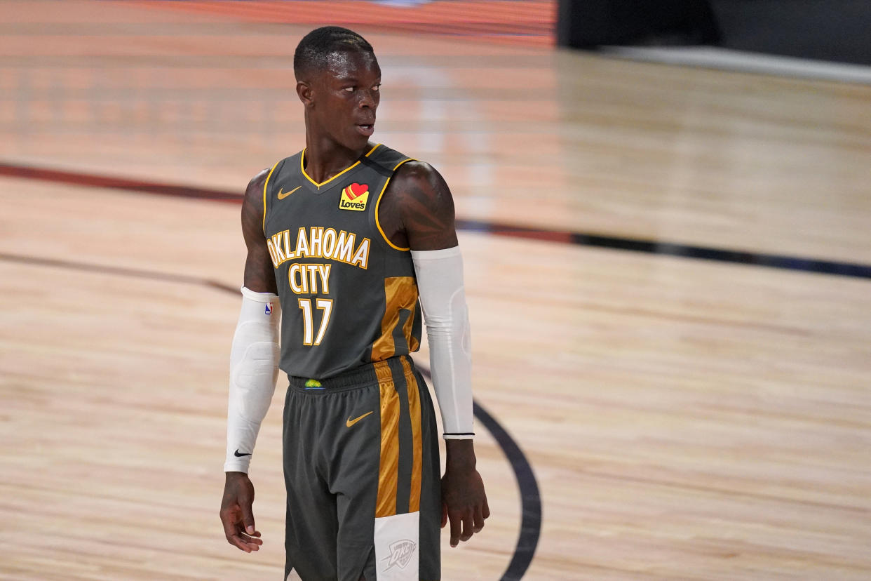 Oklahoma City Thunder's Dennis Schroder (17) looks downcourt during the first half of an NBA first-round playoff basketball game against the Houston Rockets on Monday, Aug. 31, 2020, in Lake Buena Vista, Fla. (AP Photo/Mark J. Terrill)