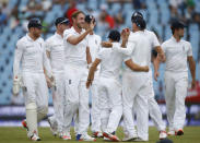 England's Stuart Broad (3rd L) celebrates with teammates the dismissal of South Africa's AB de Villiers who was caught out by Joe Root during the fourth cricket test match in Centurion, South Africa, January 22, 2016. REUTERS/Siphiwe Sibeko