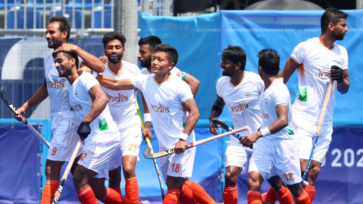 Varun Kumar of India celebrates with teammates after scoring against Argentina (Reuters)