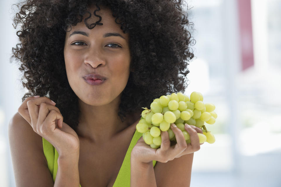 As soon as the clock strikes 12, <a href="http://www.foodrepublic.com/2012/12/28/12-grapes-at-midnight-spains-great-new-years-eve-tradition-and-superstition/">eat one grape for each month</a> of the new year -- that's 12 total -- while simultaneously making a wish for each grape that you consume.&nbsp;<br /><br />But beware! Get a sour grape and that could mean a bad month is in store for you.