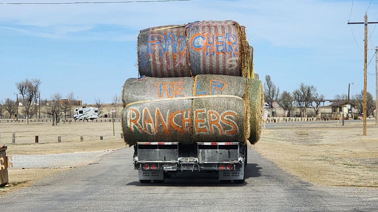 A truck carrying hay is seen heading down US 60 toward Canadian. Hay donations are pouring in to the areas impacted by wildfires ongoing in the Texas Panhandle.