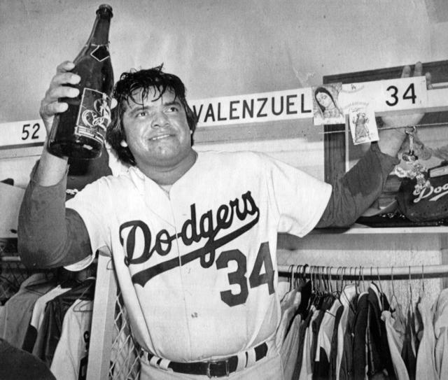 In this March 31, 2011, photo, former Los Angeles Dodgers manager Tommy  Lasorda, right, stands with former pitcher Fernando Valenzuela before a  baseball game at Dodger Stadium in Los Angeles. Lasorda, the