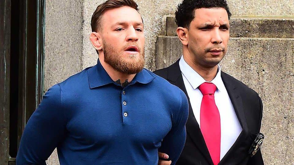 Mcgregor leaves the courthouse in cuffs. Pic: Getty