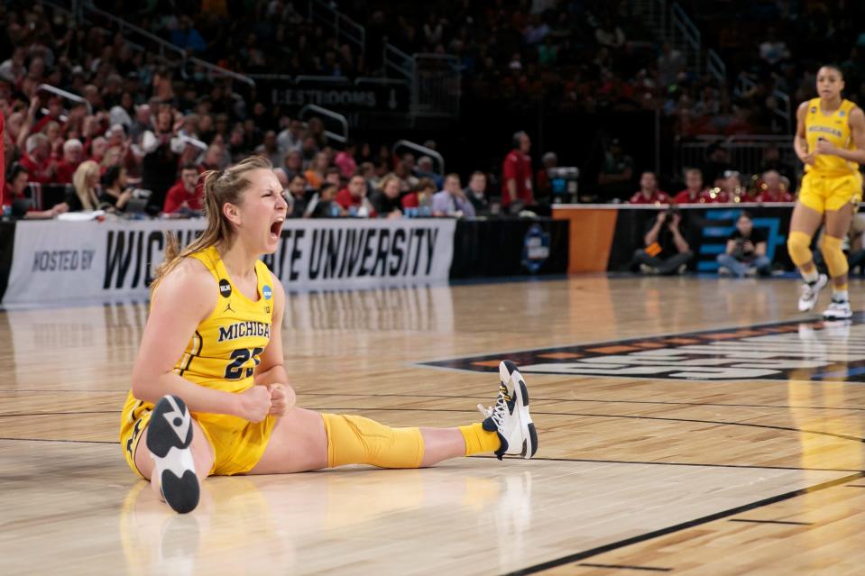 Michigan Wolverines center Brooklyn Rewers reacts after a play against the South Dakota Coyotes in the Wichita regional semifinals of the women's college basketball NCAA Tournament at INTRUST Bank Arena.