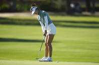 Grace Kim putts on the 13th green during the third round of the LPGA's JM Eagle LA Championship golf tournament at Wilshire Country Club, Saturday, April 27, 2024, in Los Angeles. (AP Photo/Ashley Landis)