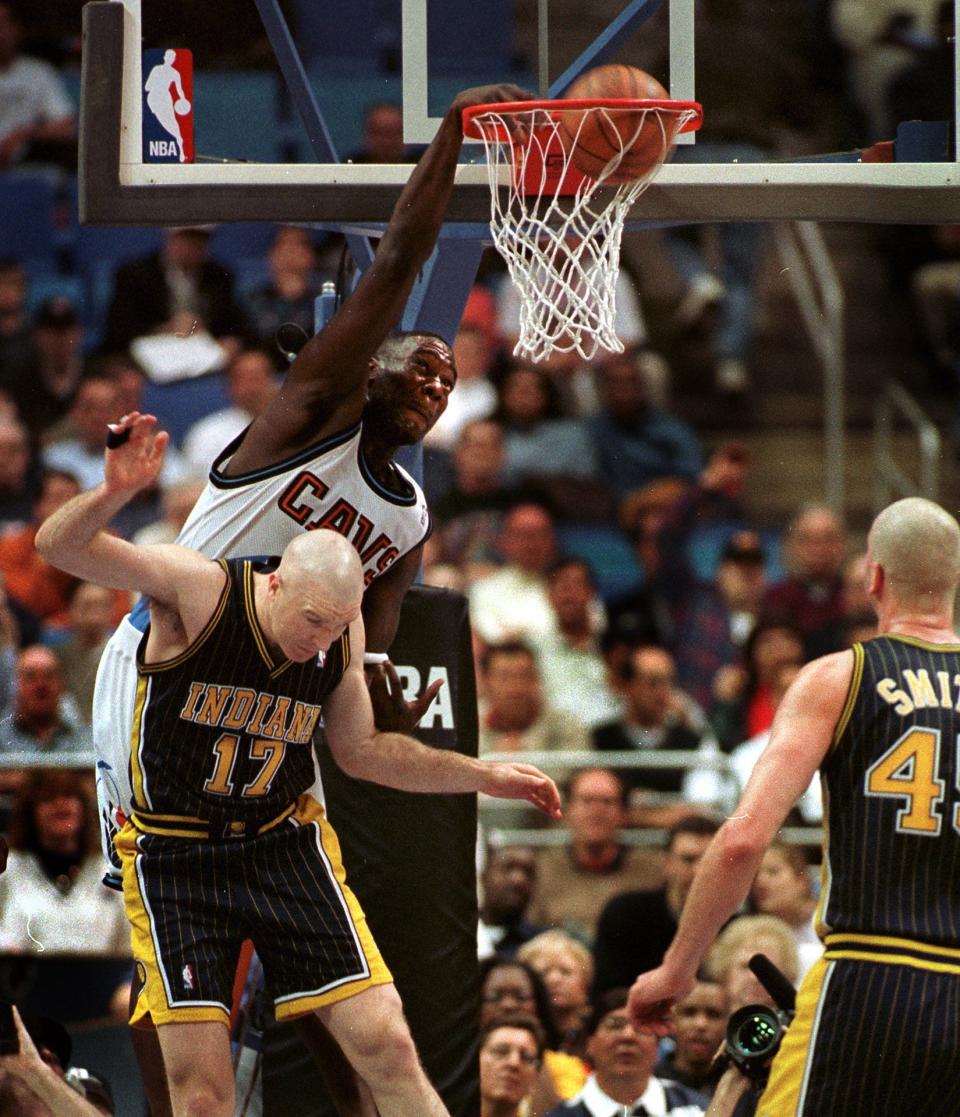 Indiana Pacers Chris Mullin gets dunked on by  Cleveland Cavaliers Shawn Kemp during the first quarter in NBA Eastern Conference first round playoff action in their best of five series.