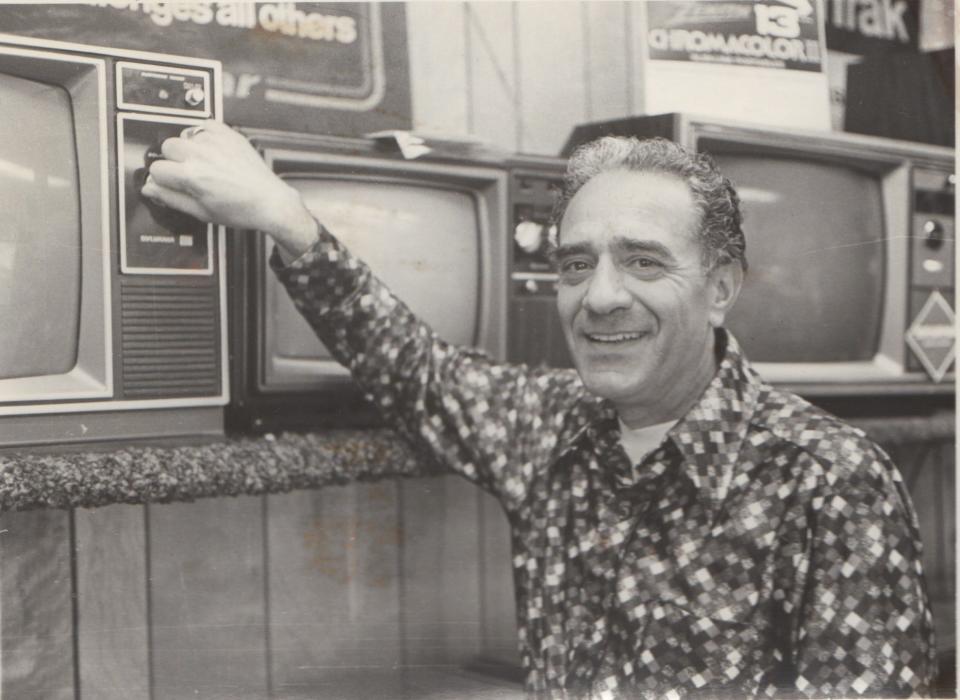 George Washington Toma started his own TV repair business in 1953 in East Weymouth and used his skills from the U.S. Army electronics training. He is shown in the late 1960s or 1970s.