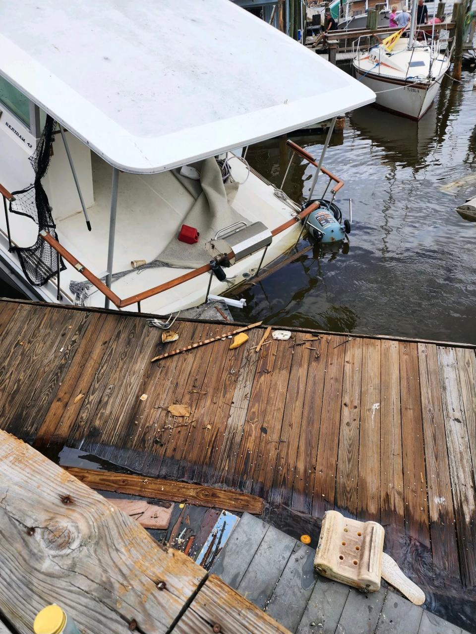 This is a photo of "Batchelor Pad" the day after Hurricane Ian in September 2022 pushed it into a dock next to Bonita Bill's restaurant and bar on San Carlos Island near Fort Myers Beach.