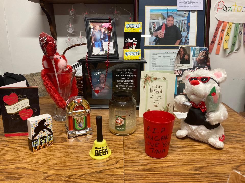 Close-up of Tina Mazzatenta's shrine to her late fiance, John Dugan, in the apartment they shared in Croydon.