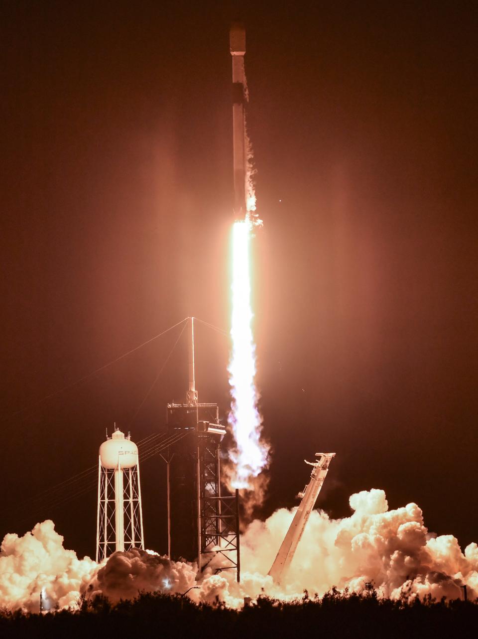 A SpaceX Falcon 9 rocket lifts off Sunday night from pad 39A at Kennedy Space Center.