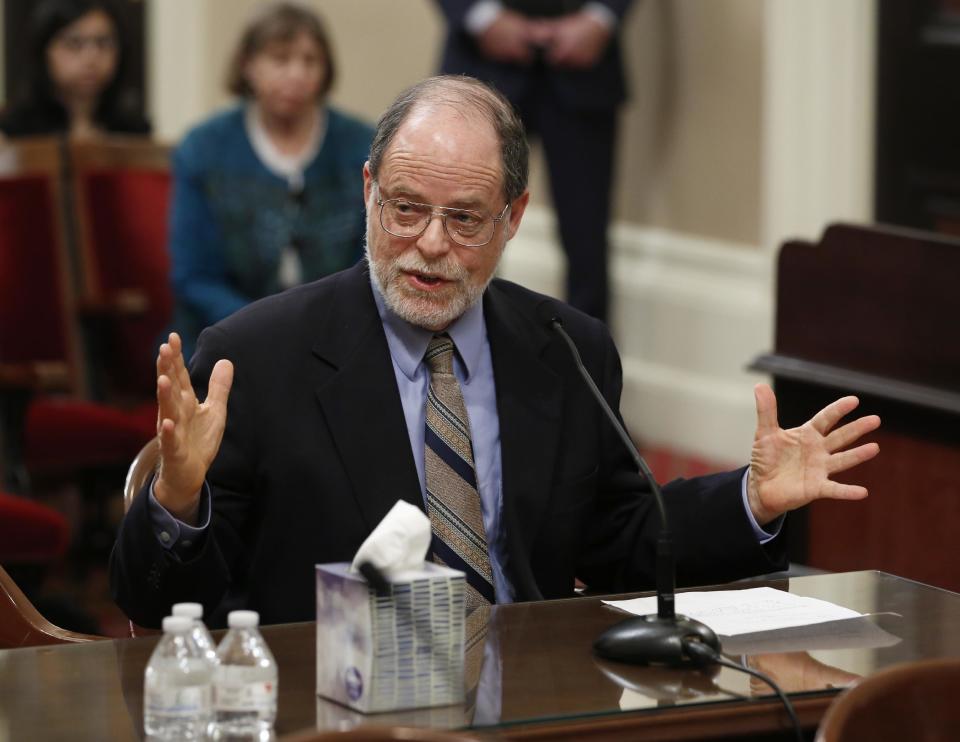 Edwin Bernbaum discuses his son, Jonathan Bernbaum, a victim of last December's Oakland warehouse fire, during a hearing of the Senate Governance and Finance Committee, Wednesday, March 15, 2017, in Sacramento, Calif. Lawmakers were exploring issues related to the fire that killed 36 in a warehouse that illegally housed an artists' collective and event space. (AP Photo/Rich Pedroncelli)