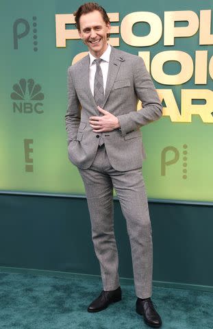 <p>Tommaso Boddi/WireImage</p> Tom Hiddleston at the 2024 People's Choice Awards