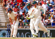 Cricket - Australia v England - Ashes test match - WACA Ground, Perth, Australia, December 17, 2017 - Australia's captain Steve Smith celebrates with team mates after taking a catch to dismiss England's captain Joe Root during the fourth day of the third Ashes cricket test match. REUTERS/David Gray