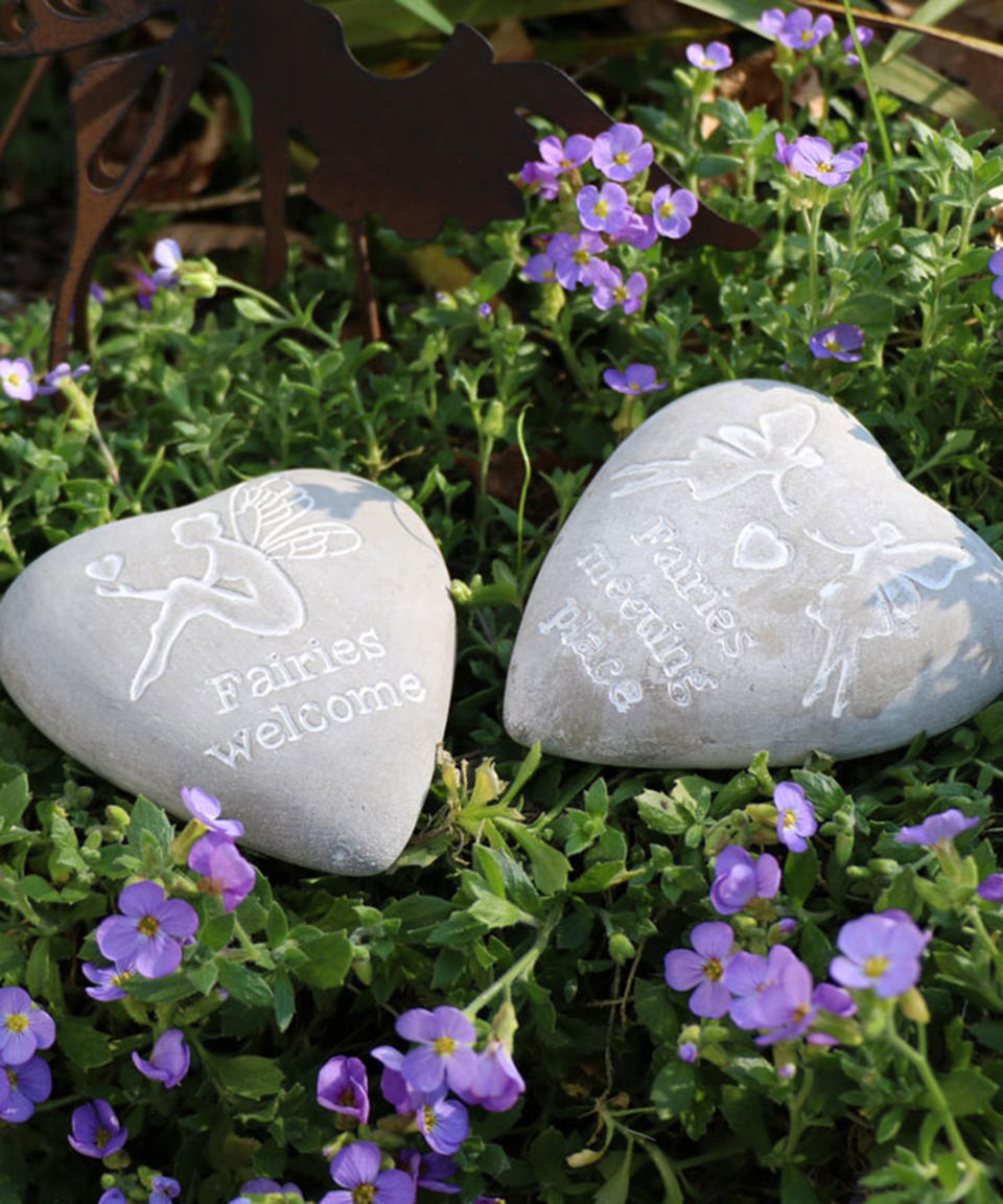 6. Nestle pebble treasures in garden borders