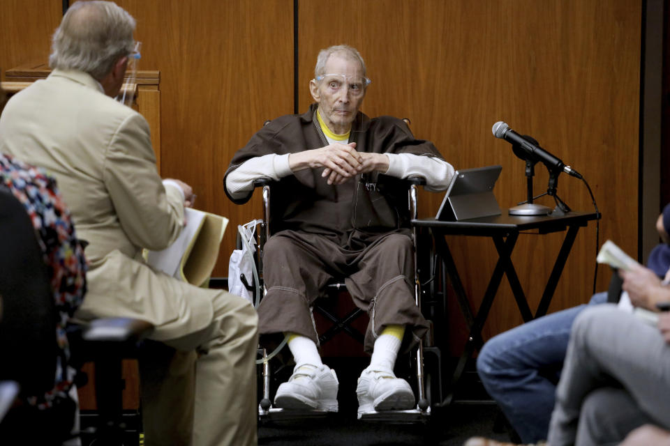 New York real estate scion Robert Durst, 78, answers questions from defense attorney Dick DeGuerin, left, while testifying in his murder trial at the Inglewood Courthouse on Monday, Aug. 9, 2021, in Inglewood, Calf. Durst is charged with the 2000 murder of Susan Berman inside her Benedict Canyon home. He testified Monday that he did not kill his best friend Berman. (Gary Coronado/Los Angeles Times via AP, Pool)