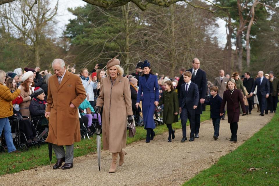The King and Queen lead the family to St Mary Magdalene Church (PA)