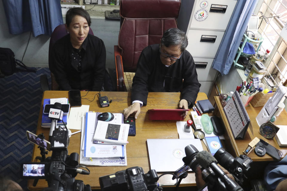 FILE - Khin Maung Zaw, left, and Min Min Soe, right, the lawyers assigned by the National League for Democracy party to represent deposed leader Aung San Suu Kyi, speak to journalists in Naypyitaw, Myanmar, on May 24, 2021. The four-year prison sentence given to ousted Myanmar leader Suu Kyi on Monday, Dec. 6, 2021 on charges of incitement and failing to observe pandemic restrictions is one small shot in a legal offensive intended to deal her and her National League for Democracy party a crippling political blow. (AP Photo, File)