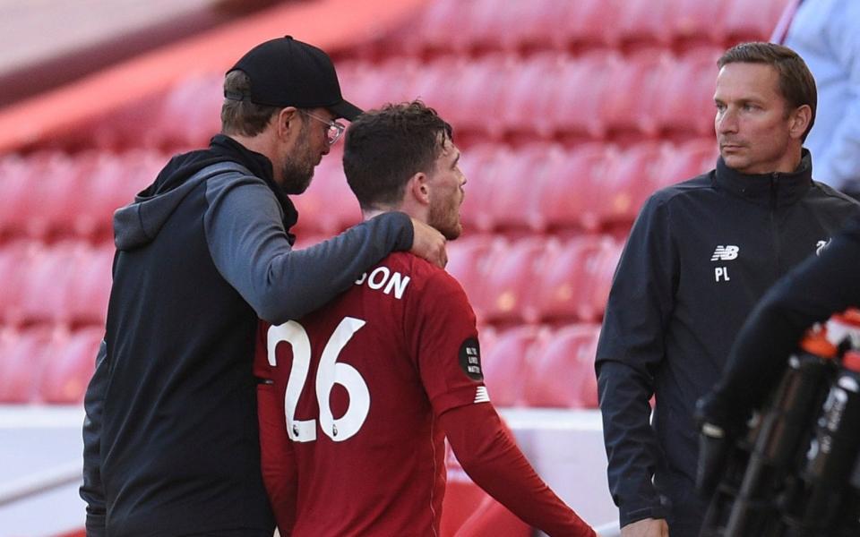 Klopp eventually led a furious Robertson away won the tunnel - AFP