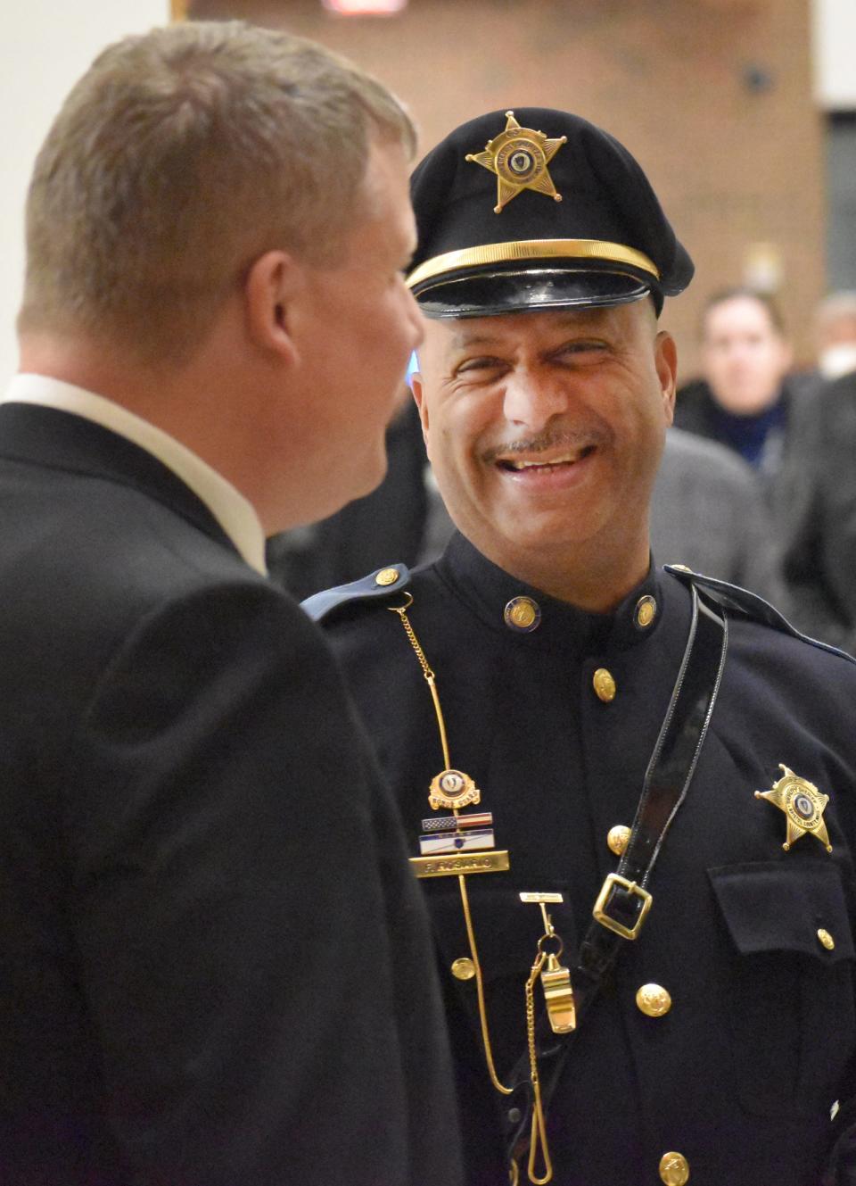 Bristol County Sheriff Paul Heroux speaks to a member of the Bristol County honor guard before being sworn in Tuesday, Jan. 3 at B.M.C. Durfee High School in Fall River.