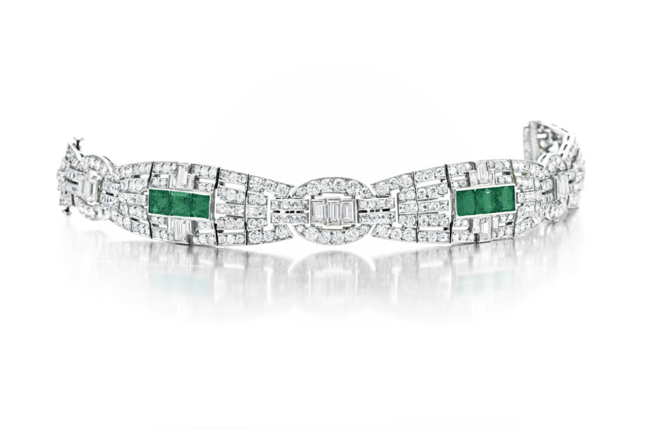 In this undated photo provided by Christie’s Auction House in New York, a circa 1925 art deco emerald and diamond Cartier bracelet from the estate of the late copper heiress Huguette Clark is shown. The piece sold for $110,500.00 at Christies’ New York Magnificent Jewels auction on Tuesday, April 17, 2012. (AP Photo/Christie’s Auction House)