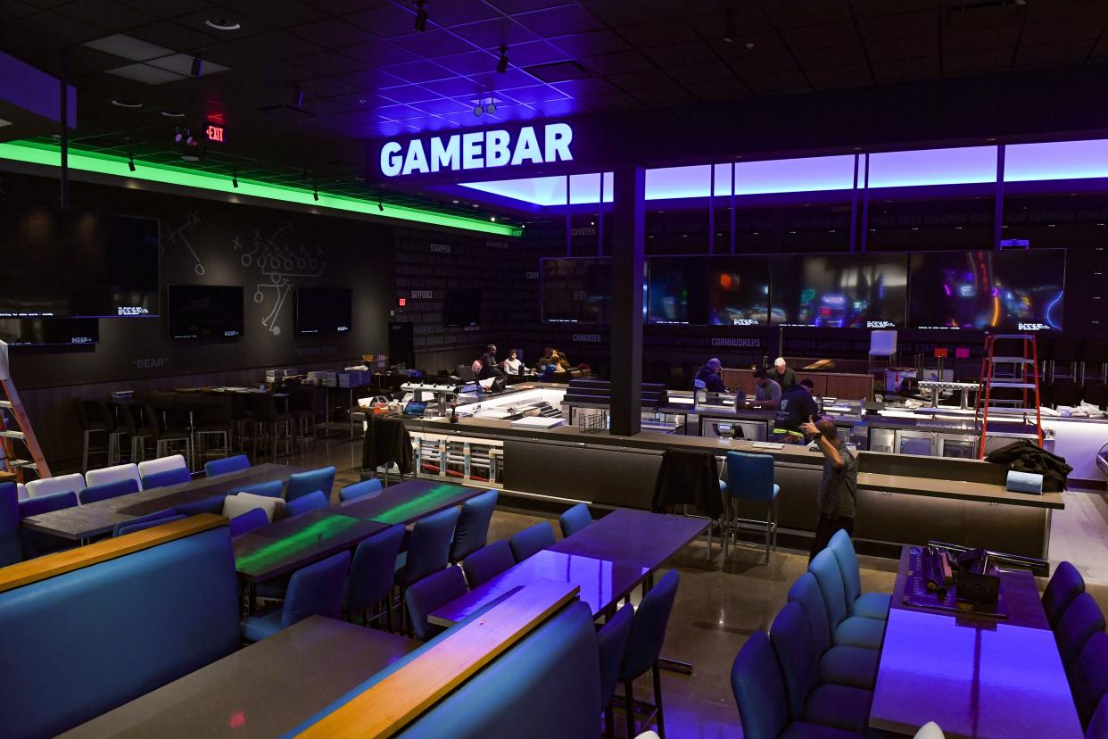 The bar and restaurant side of Dave and Buster's includes 18 TV screens and dozens of tables and booths, as seen on Wednesday, March 23, 2022, at Lake Lorraine in Sioux Falls.