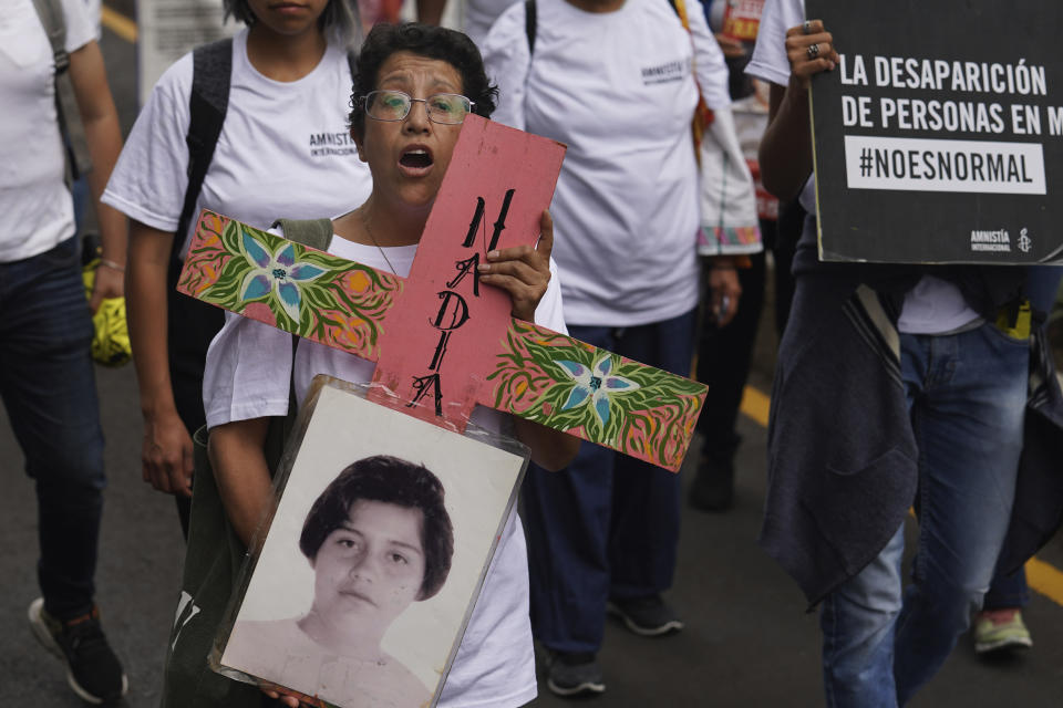 Mothers of disappeared children march to demand government help in the search for their missing loved ones, on Mother's Day in Mexico City, Wednesday, May 10, 2023. (AP Photo/Marco Ugarte)
