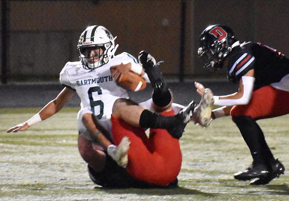 Dartmouth's Nikko Morris (6) is tackled by Durfee.
