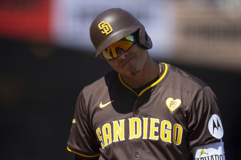 San Diego Padres designated hitter Manny Machado reacts to being called out on strikes during the eighth inning of a baseball game against the San Francisco Giants, Sunday, April 7, 2024, in San Francisco. (AP Photo/D. Ross Cameron)