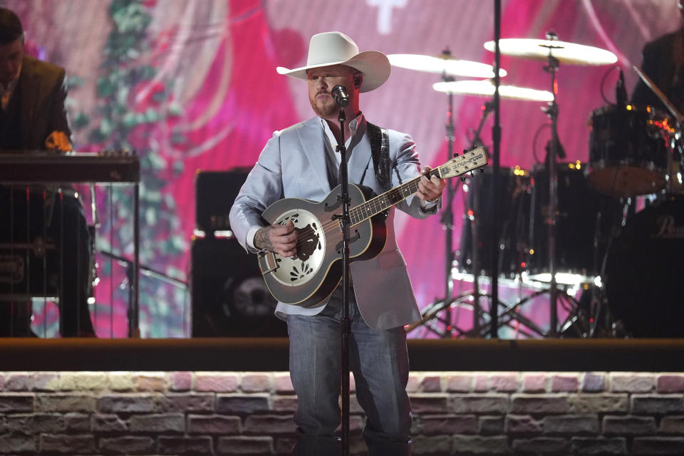 Cody Johnson performs "The Painter" at the 57th Annual CMA Awards on Wednesday, Nov. 8, 2023, at the Bridgestone Arena in Nashville, Tenn. (AP Photo/George Walker IV)
