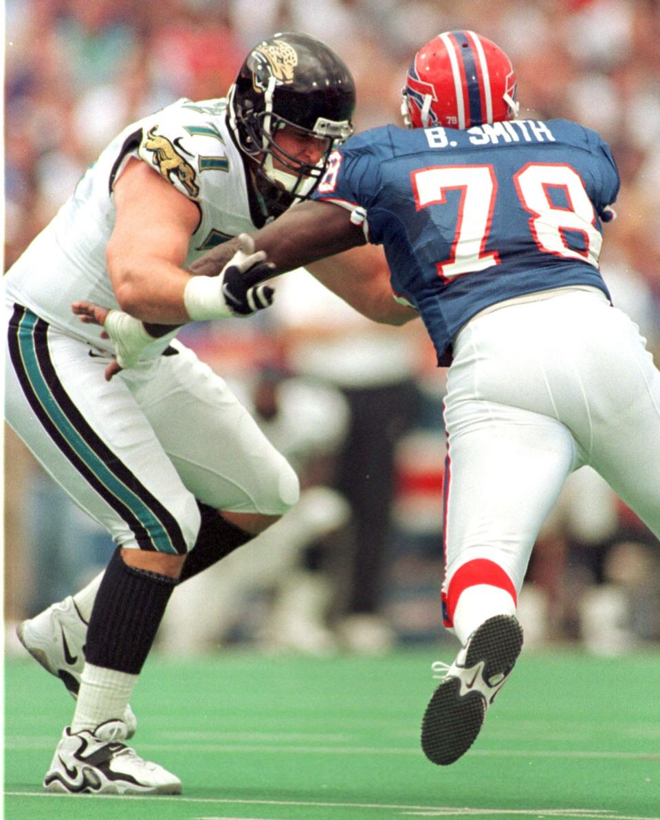 Jacksonville Jaguars offensive tackle Tony Boselli (71) blocks Buffalo Bills defensive end Bruce Smith (78) during the second quarter of an NFL football game on October 18, 1998. [Rick Wilson/Florida Times-Union]