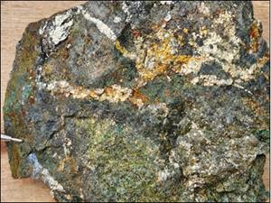 Figure 4 – Altered Diorite Specimen Displaying Pyrite and Chalcopyrite in Veinlets and Disseminations, with Chalcocite and Malachite